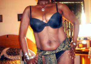 Ebony naked milf posing, upskirt porn photos